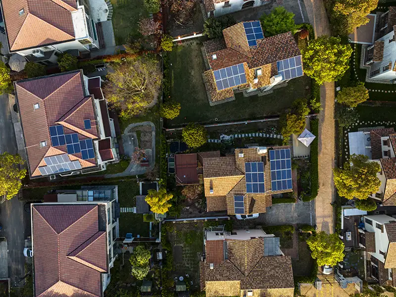 A birds eye view of a dense housing development.