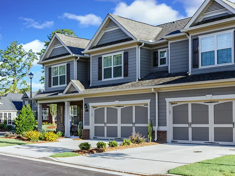 Street view of a modern townhome.